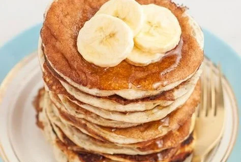 Delicious homemade 4-ingredient protein pancakes topped with fresh fruits