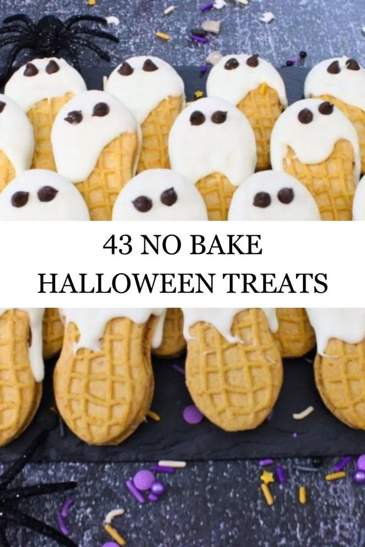 A variety of cute no bake Halloween treats arranged on a festive table.