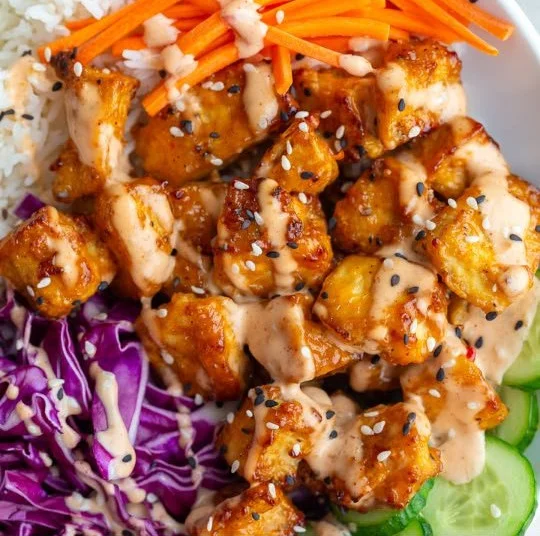 Crispy Air Fryer Bang Bang Tofu served on a plate with dipping sauce