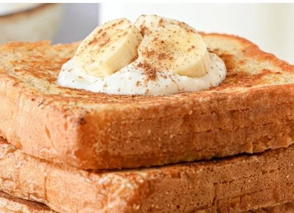 Delicious anabolic protein French toast topped with fresh berries and syrup
