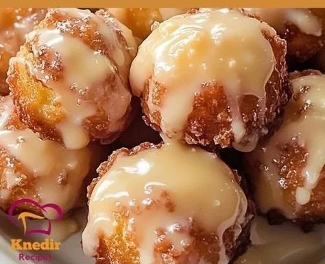 Delicious baked apple fritters, soft and glazed, ready to be enjoyed