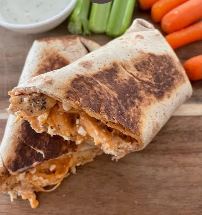 Buffalo Chicken Wrap with 51 grams of protein, a healthy meal choice.