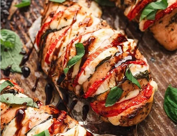 Delicious Caprese Stuffed Chicken with fresh ingredients on a plate