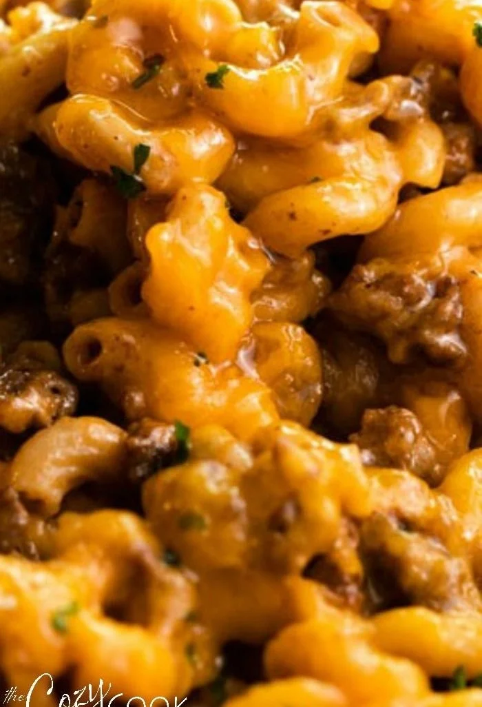 Delicious cheeseburger casserole topped with melted cheese and ingredients.