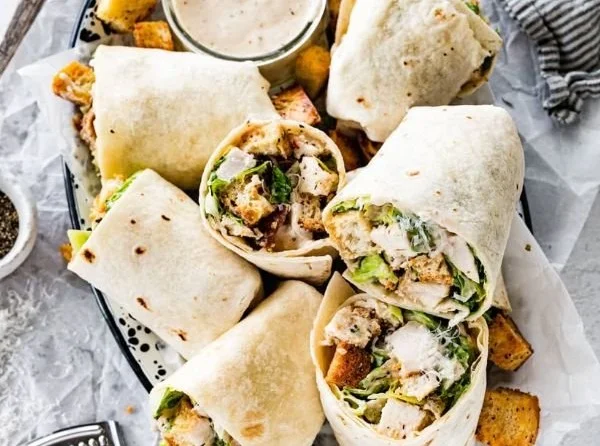 Delicious Chicken Caesar Wrap with grilled chicken, romaine, and dressing