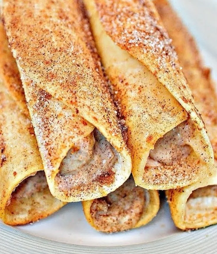 Crispy Keto Cinnamon Cream Cheese Roll Ups on a plate