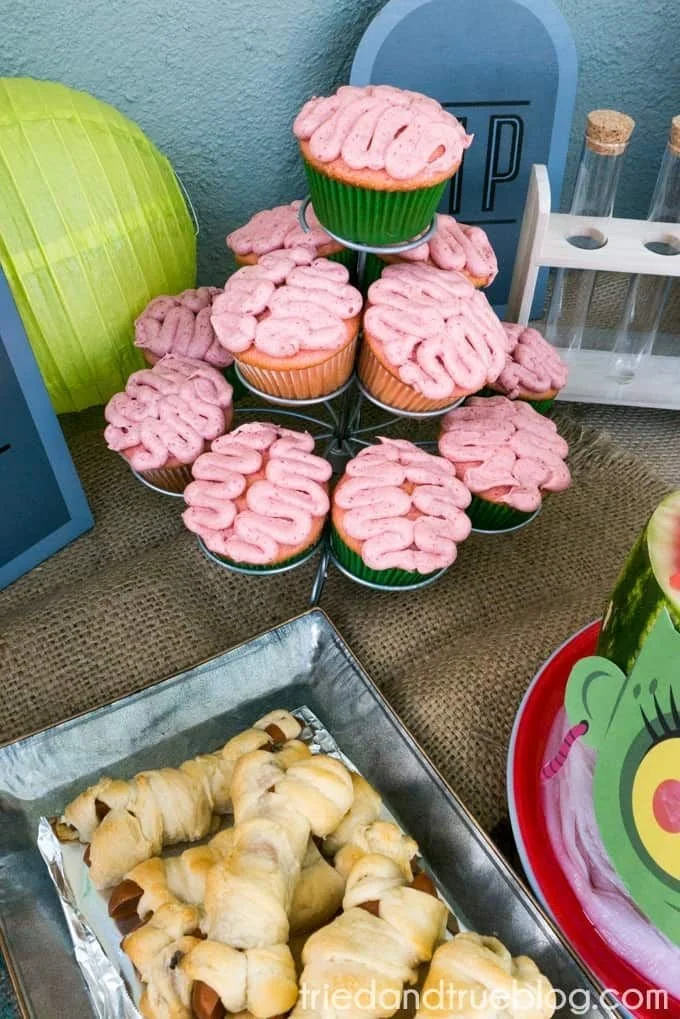 Cute Halloween Zombie Party setup for kids with decorations and treats