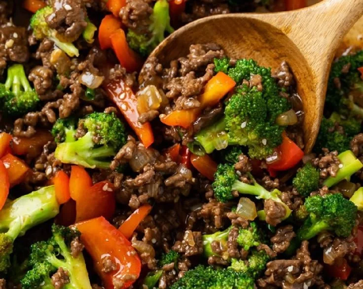 Ground beef stir-fried with broccoli in a vibrant and healthy dish