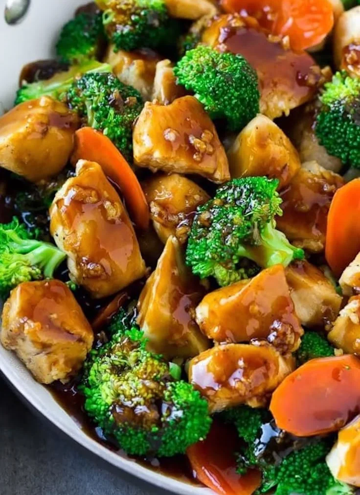 Healthy chicken stir fry with vibrant vegetables in honey garlic sauce