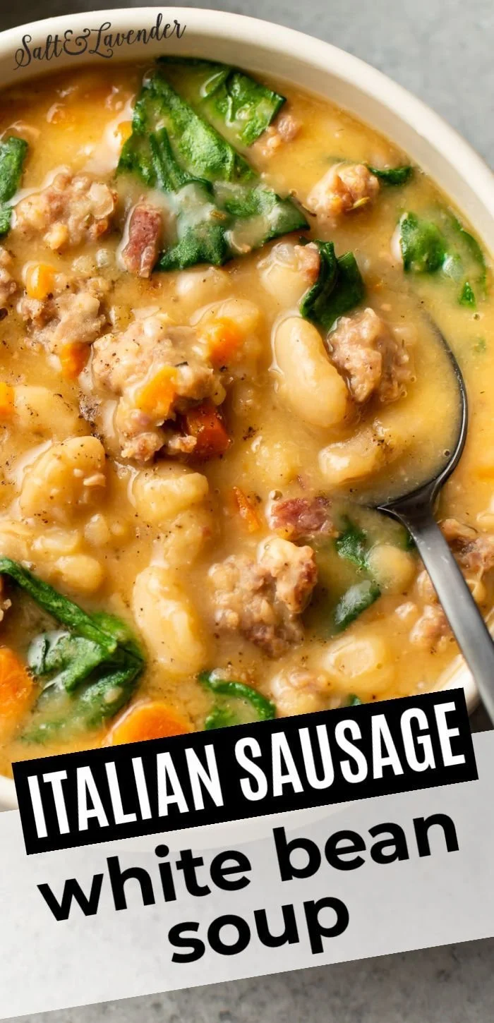 Bowl of Italian sausage white bean soup garnished with herbs