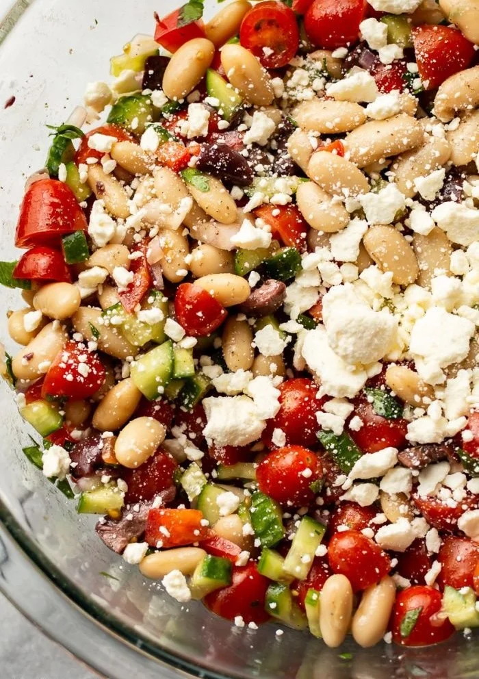 Mediterranean white bean salad with fresh vegetables and herbs