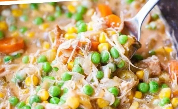 Delicious slow cooker chicken pot pie with tender chicken and vegetables