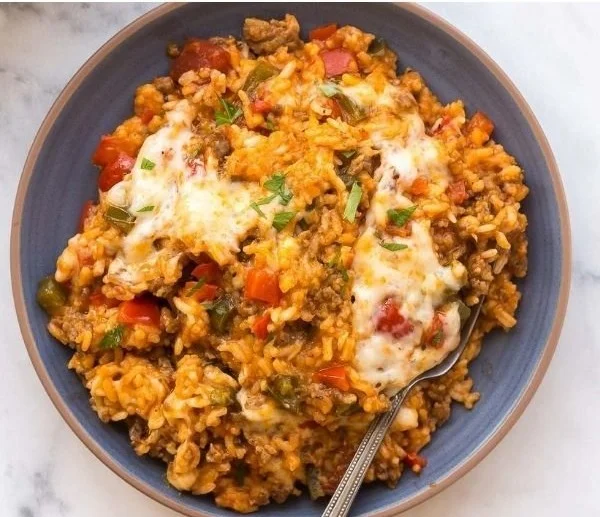 Delicious stuffed pepper casserole served in a baking dish with vibrant colors.