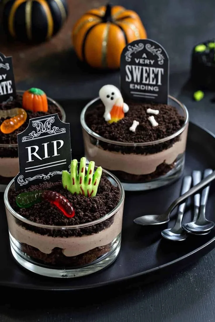 Delicious Brownie Dirt Pudding dessert layered with brownies and creamy pudding.