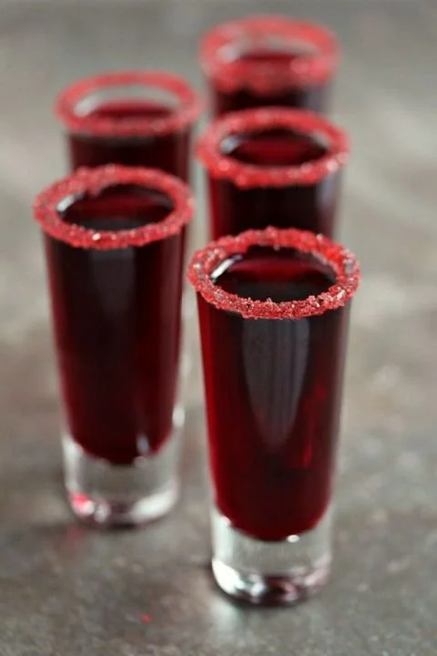 Colorful Halloween cocktails served at a spooky themed party