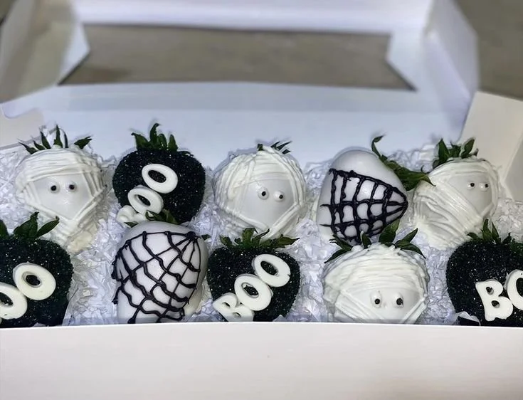 Halloween Chocolate Covered Strawberries designed as Ghost Face, white chocolate treats