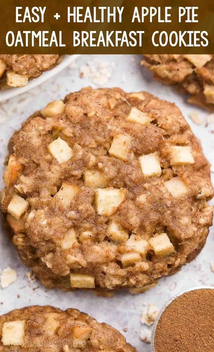 Healthy apple pie oatmeal breakfast cookies on a wooden table