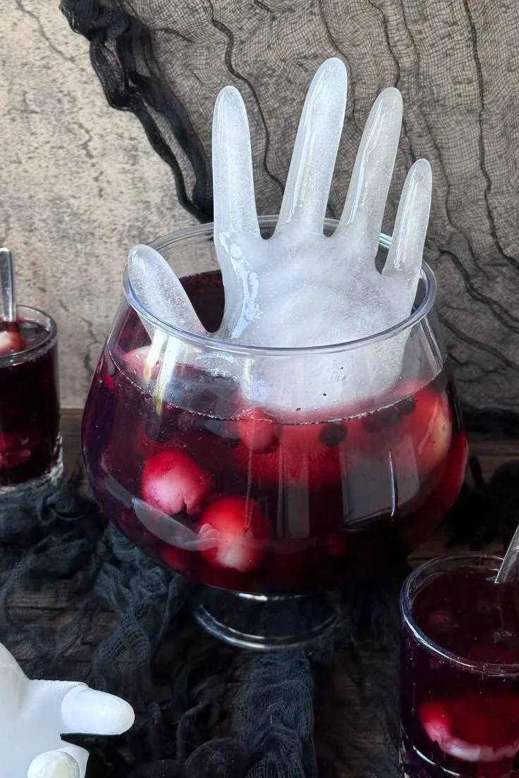 Alcohol-free Halloween-Bowle with lychee and fruits for a spooky party