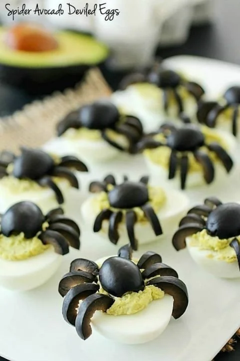 Spider avocado deviled eggs, cute Halloween snacks for kids