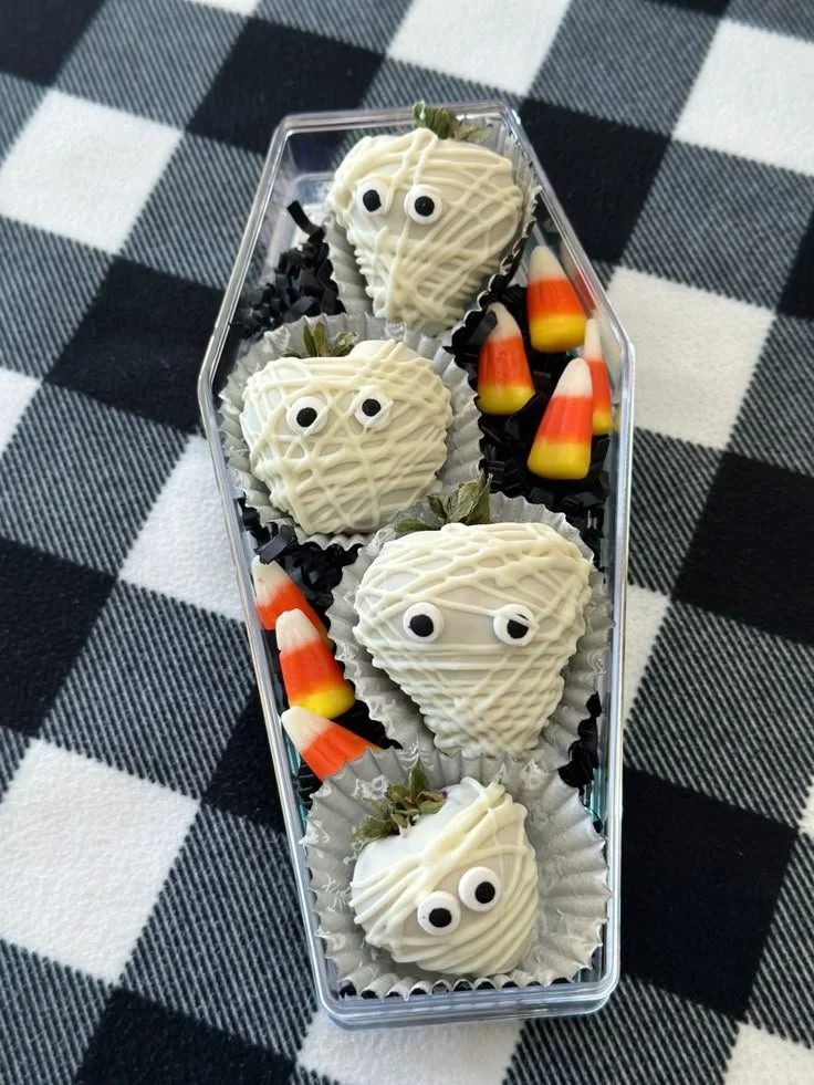 A collection of spooky berries, perfect for Halloween-themed recipes and decorations.