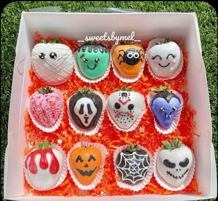 Spooky Halloween cupcakes and chocolate covered strawberries for Halloween treats