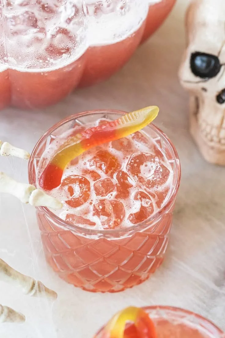 Spooky Halloween punch in a bowl with festive ingredients