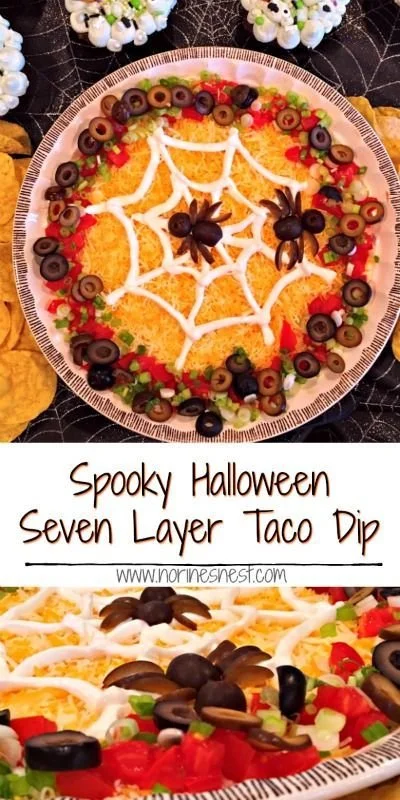Spooky Halloween Seven Layer Taco Dip in a festive serving dish